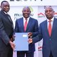 Dr James Mwangi, Equity Group Managing Director and CEO (centre), William Rahedi, Spire Bank Board Chairman (right) and Joel Gachari, Mwalimu National Sacco National Chairman (right) during the partnership signing ceremony