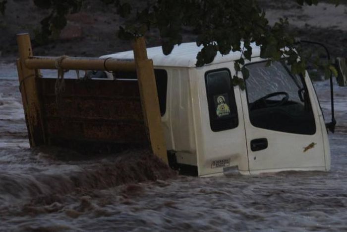 A lorry stuck inside Muswii River in Makueni County