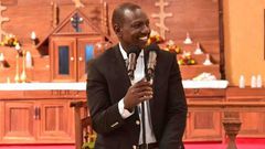 File image of President William Ruto at a past church service