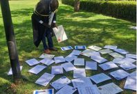 Alson Manyama with his academic papers