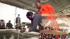 Pastor Kanyari directing one of his follower to wash her face and drink water from his newly built 'Bethsaida' pool