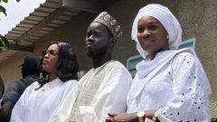 President Bassirou Diomaye Faye (centre), and his wives, Marie Khone Faye (right) and Absa Faye (left) [VOA]