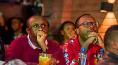 Abel Mutua and Phil Director