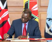 President William Ruto signs a document at State House, Nairobi on May 2, 2024