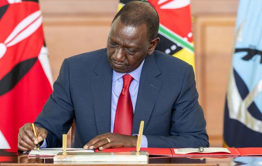 President William Ruto signs a document at State House, Nairobi on May 2, 2024