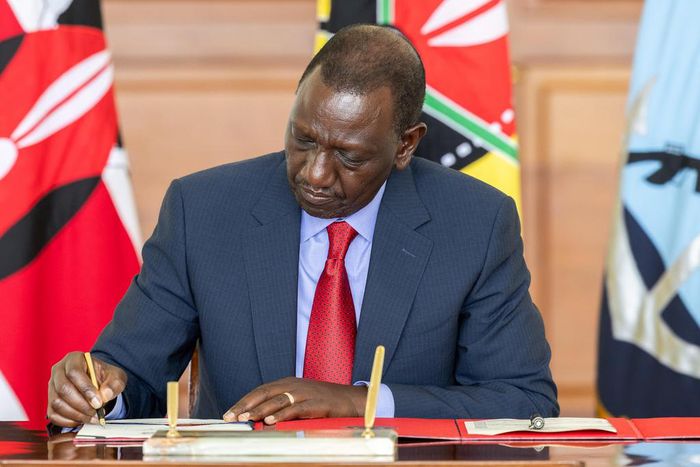 President William Ruto signs a document at State House, Nairobi on May 2, 2024