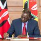 President William Ruto signs a document at State House, Nairobi on May 2, 2024