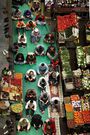 Muslims taking a break from work beside their stalls to pray during Ramadan