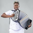 DJ Fatxo posing with an accordion