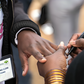 An election official marks the nail of a voter to indicate they have cast their ballots and completed voting at a polling station in the Mathare neighborhood of Nairobi. Photo Credit: Nickolai Hammar/NPR