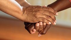 Two people holding hands [Photo: Pixabay]