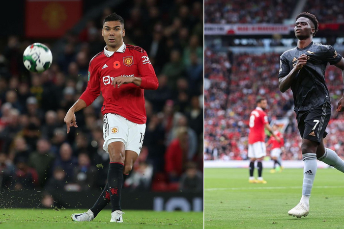 Casemiro of Manchester United (left) and Bukayo Saka of Arsenal
