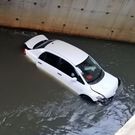 Ex-KTN star Jamal Gaddafi narrowly escapes death as his car is swept by floods in Westlands