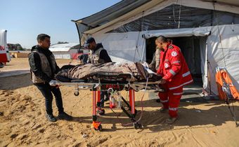 Patients receive treatment in a field hospital built by the International Medical Corps on January 16, 2024 in Rafah, Gaza.Ahmad Hasaballah/Getty Images
