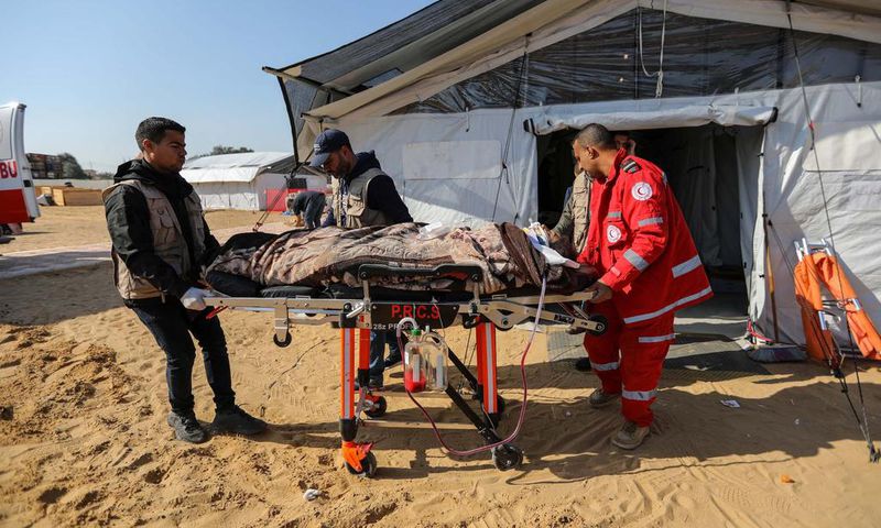 Patients receive treatment in a field hospital built by the International Medical Corps on January 16, 2024 in Rafah, Gaza.Ahmad Hasaballah/Getty Images