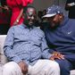 ODM leader Raila Odinga speaks with Lang'ata MP Jalang'o during a birthday party at Saboti MP Caleb Amisi's house