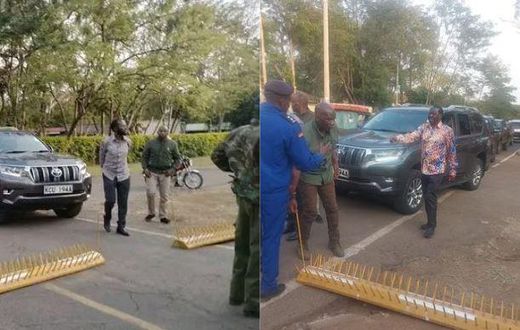 Raila Odinga and his entourage at a roadblock when his motorcade was blocked along road leading to Kisumu State Lodge on Friday, March 10.