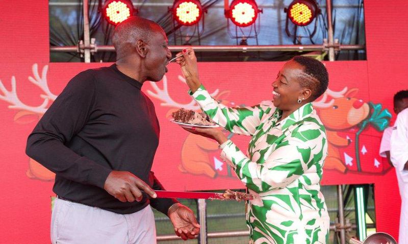 Rachel Ruto feeds President William Ruto a cake at State House, Nairobi