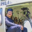 Government Spokesman Isaac Mwaura in a chopper
