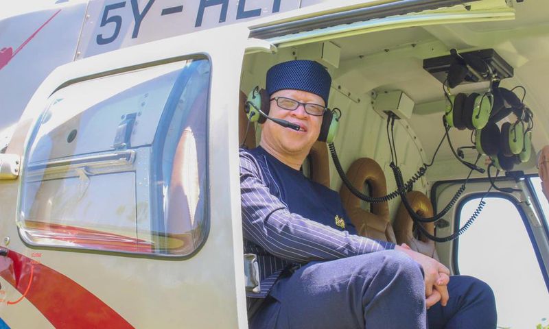 Government Spokesman Isaac Mwaura in a chopper