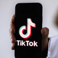 A collage of ICT CS Eliud Owalo and the TikTok logo