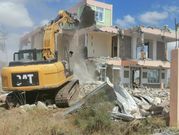 A house being flattened in Athi River