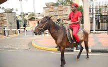 Eric Omondi on a horse outside Parliament Buildings on Friday, June 21, 2024 shortly before his arrest