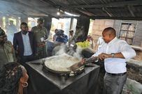 Interior CS Kithure Kindiki cooks ugali at Mwea Prison in Kirinyaga County on Monday, May 8, 2023.