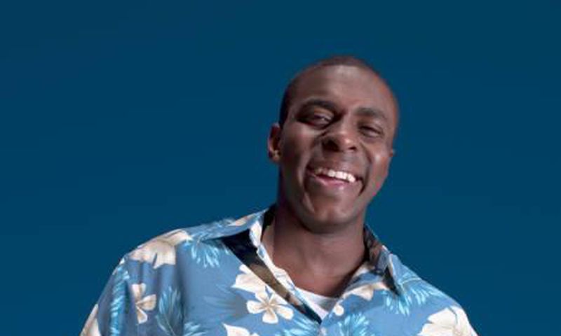 A man in a flowery pattern shirt
