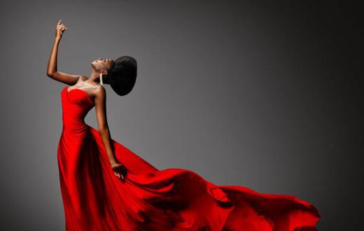 A lady in red dinner dress