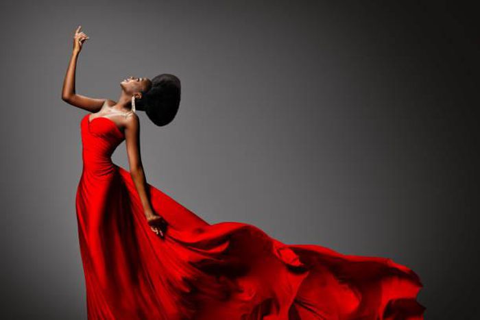 A lady in red dinner dress