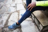 Man experiencing post work out pain