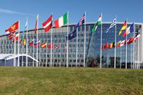 Flags of member nations flap in the wind outside NATO headquarters during a meeting of NATO foreign ministers in Brussels, Tuesday, April 4, 2023.AP Photo/Geert Vanden Wijngaert