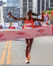 Ruth Chepng'etich cuts the tape to win the 2022 Chicago Marathon/COURTESY