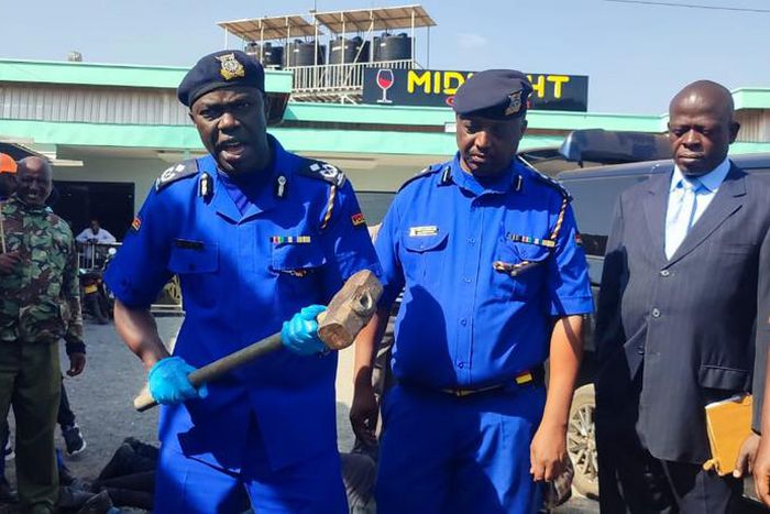 Police officers at Midnight Gardens, opposite the GSU Recce Squad camp in the Kimbo area within Ruiru, Kiambu County.