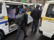 Kepha Muogoi and his son learned about the postponement of  school opening dates after travelling overnight to Nairobi.