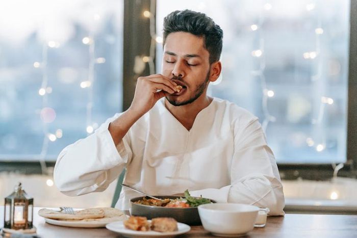 A man having supper [Image Credit: Michael Burrows]