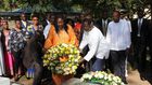 Raila Odinga with his wife Ida Odinga and President Uhuru Kenyatta lay wreaths at the mausoleum which hosts Oginga Odinga and Fidel Odinga's graves (Twitter)