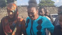 In the middle, mother to the late Kennedy Onyango who was shot in Rongai