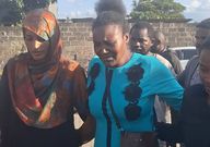 In the middle, mother to the late Kennedy Onyango who was shot in Rongai