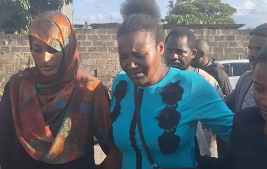In the middle, mother to the late Kennedy Onyango who was shot in Rongai