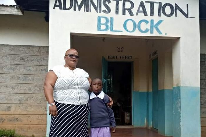 Teacher Joyce Malit with her pupil