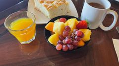 You also get fresh fruit and pineapple-coconut breakfast bread.