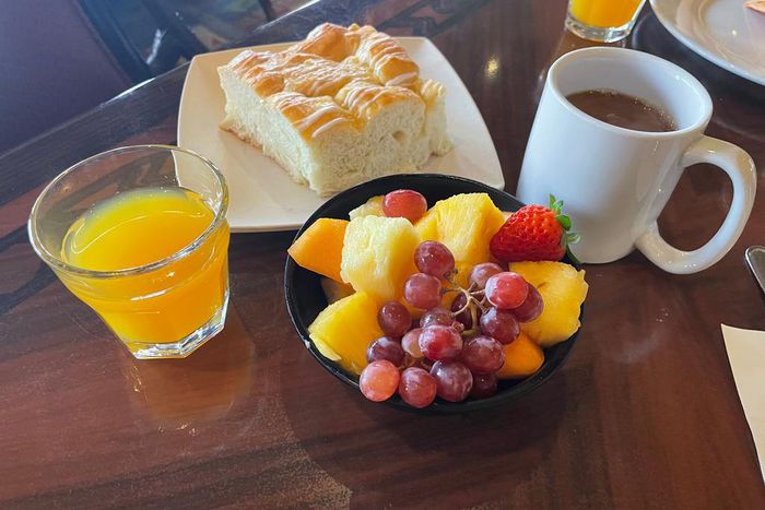 You also get fresh fruit and pineapple-coconut breakfast bread.