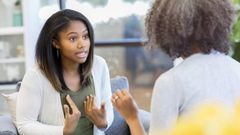 A photo of siblings arguing