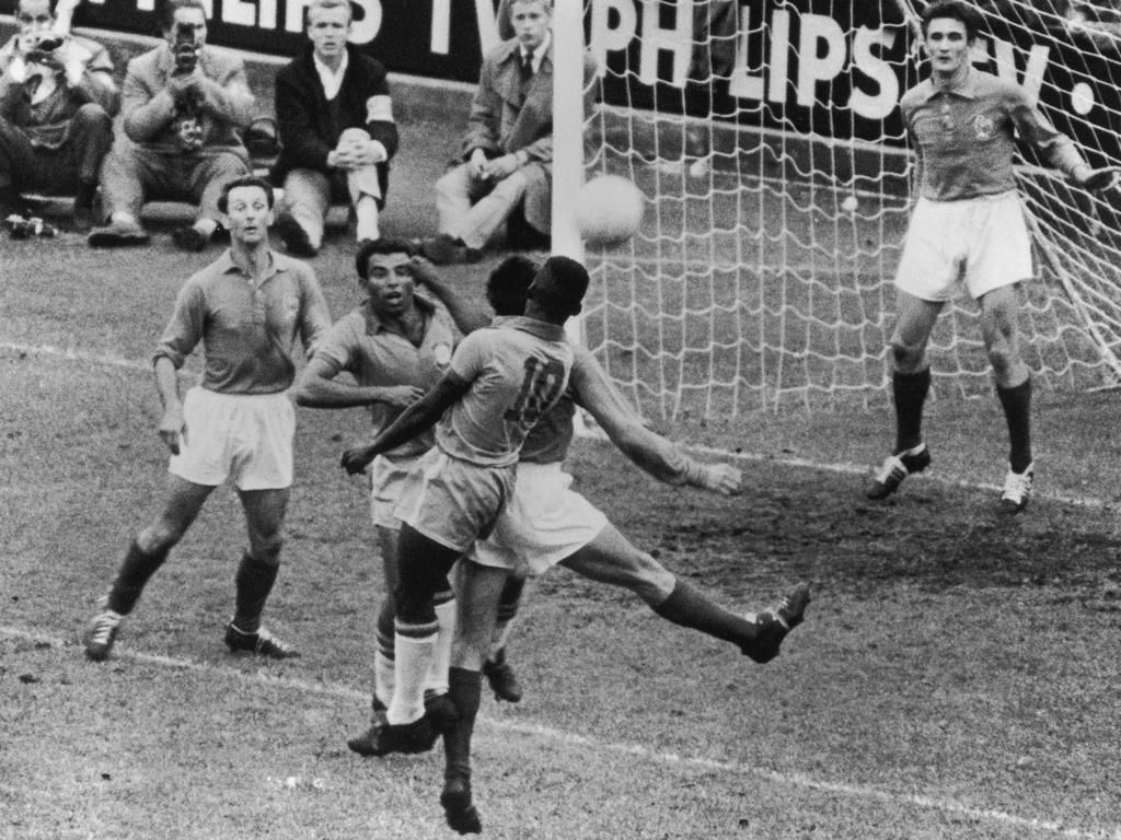 Pele (10) heads a ball at the 1958 World Cup.Keystone/Hulton Archive/Getty