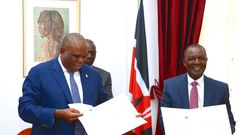 Treasury CS Njuguna Ndung'u and AfriExim President Benedict Oramah signing a Sh400 billion loan at State House on May 2, 2023