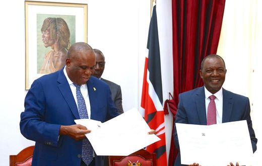Treasury CS Njuguna Ndung'u and AfriExim President Benedict Oramah signing a Sh400 billion loan at State House on May 2, 2023