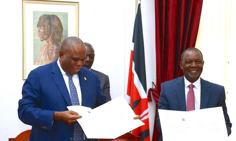 Treasury CS Njuguna Ndung'u and AfriExim President Benedict Oramah signing a Sh400 billion loan at State House on May 2, 2023