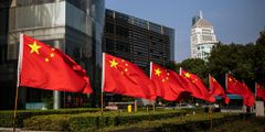The national flag of China is displayed in a street in Wuhan, Hubei province, China.Getty Images